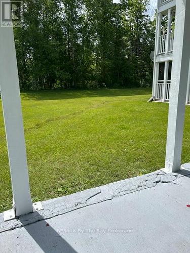 Back patio - walkout to the grass! - 1 - 10 Mulligan Lane, Wasaga Beach, ON - Outdoor