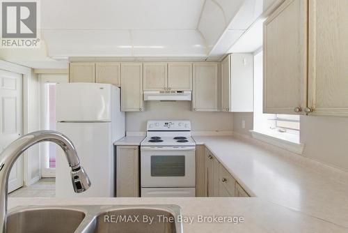 Kitchen - 1 - 10 Mulligan Lane, Wasaga Beach, ON - Indoor Photo Showing Kitchen
