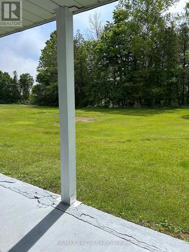 back patio overlooking nature and the golf course! - 1 - 10 Mulligan Lane, Wasaga Beach, ON - Outdoor