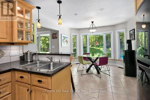 Kitchen  & Breakfast Nook overlook back yard - 157 Glen Fiddish Road, West Grey, ON - Indoor Photo Showing Kitchen With Double Sink