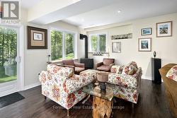 Lower level with lots of natural light & fireplace - 