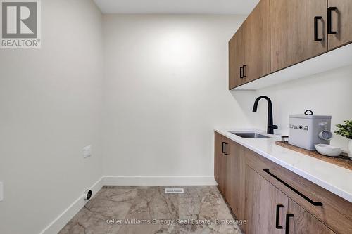 Main floor laundry room - 13 Partridge Hollow Road, Prince Edward County (Hillier Ward), ON 