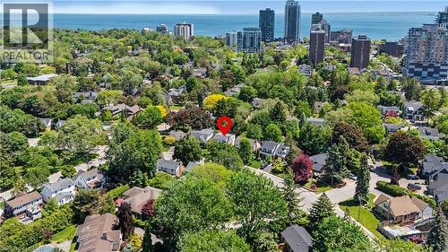 Aerial perspective showcasing a residential area with mature trees and established homes - 2068 Wellington Avenue, Burlington, ON 
