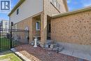 Brick and siding exterior featuring a covered entry - 20 Ridgeway Crescent, Kitchener, ON  - Outdoor With Exterior 