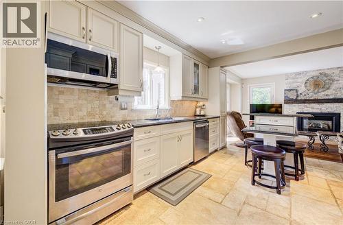 135 Royal Orchard Drive, Kitchener, ON - Indoor Photo Showing Kitchen With Fireplace With Upgraded Kitchen