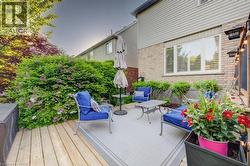 Wood-finish deck with a designated outdoor seating area - 