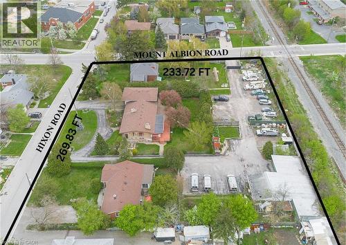 Expansive aerial view showcasing a large corner parcel with significant road frontage on Hixon Road and Mount Albion Road - 262-270-276 Hixon Road, Hamilton, ON 