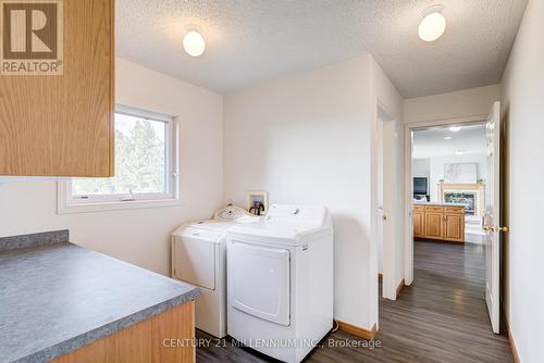 Laundry with plenty of storage - 402047 County Rd 15, East Luther Grand Valley, ON 