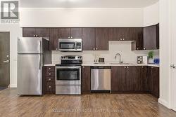 Kitchen w/ Stainless Steel Appliances - 
