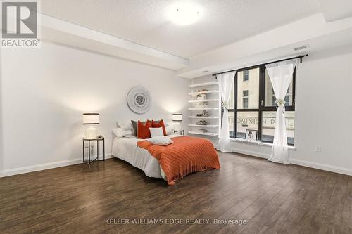 Spacious primary bedroom with large windows - 408 - 112 King Street E, Hamilton, ON 