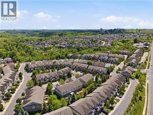 Extensive residential area featuring numerous townhomes and detached properties - 7 Upper Mercer Street Unit# G30, Kitchener, ON - Outdoor With View
