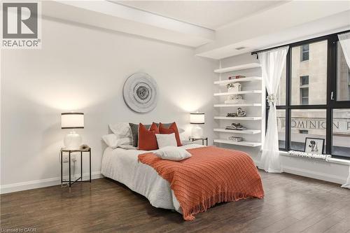 Spacious primary bedroom with large windows, 4PC Ensuite & Closet - 112 King Street E Unit# 408, Hamilton, ON 
