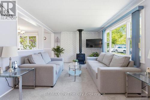 Living room with gas f/p - 3 Golf Avenue, Wasaga Beach, ON 
