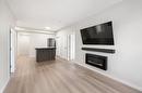 419-2301 Carrington Road, West Kelowna, BC  - Indoor Photo Showing Living Room With Fireplace 
