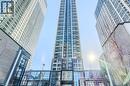 Modern high-rise residential building with extensive window features and multiple balconies - 7 Mabelle Avenue Unit# Ph07, Toronto, ON 
