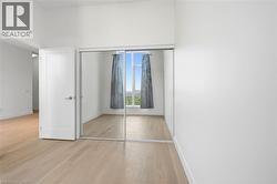 Room featuring expansive mirrored closet doors - 