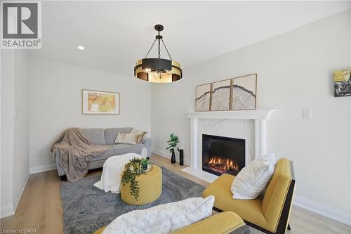 11 Wessenger Drive, Barrie, ON - Indoor Photo Showing Living Room With Fireplace