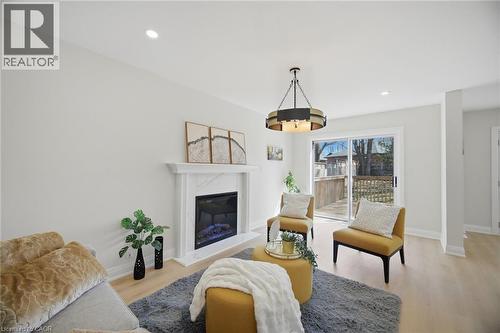 11 Wessenger Drive, Barrie, ON - Indoor Photo Showing Living Room With Fireplace