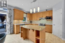 Tions of cabinetry and walk-in pantry - 