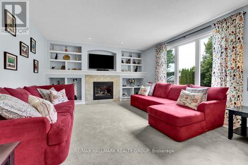 Gorgeous family room with fireplace and built-ins. - 151 Charlie'S Lane, Ottawa, ON 