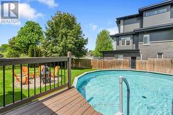 Backyard oasis- pool, deck, gazebo and firepit. - 
