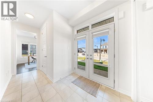 Entryway featuring french doors and tile patterned flooring - 1 Bee Crescent, Brantford, ON 