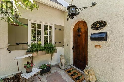 Custom front door with speakeasy. Antique fixture. - 3040 First Street, Burlington, ON - Outdoor