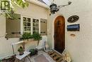 Custom front door with speakeasy. Antique fixture. - 3040 First Street, Burlington, ON  - Outdoor 