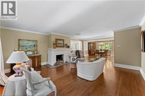 Open concept main floor, adjacent sunroom. Refinished quarter-cut oak flooring. - 3040 First Street, Burlington, ON - Indoor Photo Showing Kitchen With Upgraded Kitchen