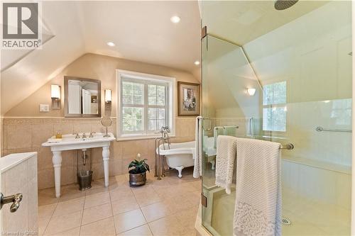 2 double closets, California shutters, built in vanity. Hand scraped dark maple flooring. - 3040 First Street, Burlington, ON - Indoor Photo Showing Bedroom
