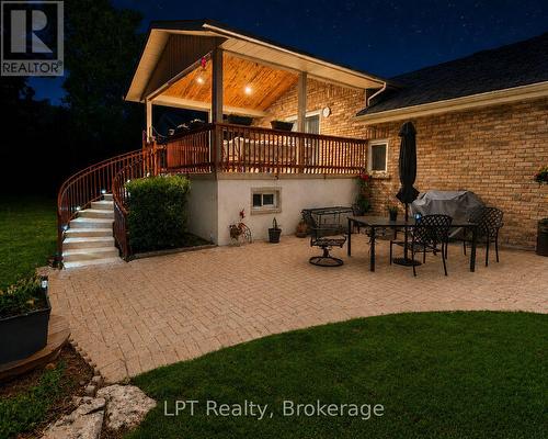 Back Deck & Patio Night Time With Beautiful Lights - 10 Vicari Road, Brighton, ON - Outdoor With Deck Patio Veranda