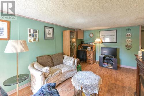 Living Rm (AI enhanced) - 3427 Coronation Avenue, Severn (West Shore), ON 