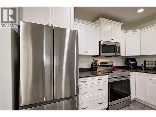 345 Mills Road Unit# 305, Kelowna, BC - Indoor Photo Showing Kitchen With Stainless Steel Kitchen