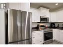 345 Mills Road Unit# 305, Kelowna, BC  - Indoor Photo Showing Kitchen With Stainless Steel Kitchen 