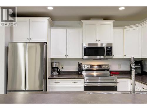 345 Mills Road Unit# 305, Kelowna, BC - Indoor Photo Showing Kitchen With Stainless Steel Kitchen