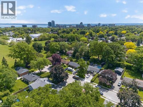Expansive aerial perspective showcasing a residential neighborhood with mature trees - 603 Cornick Drive, Burlington, ON 