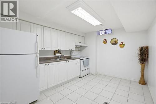 3277 Folkway Drive, Burlington, ON - Indoor Photo Showing Kitchen With Double Sink
