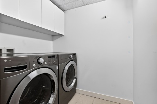Salle de lavage - 709-905 Av. Plymouth, Mont-Royal, QC - Indoor Photo Showing Laundry Room