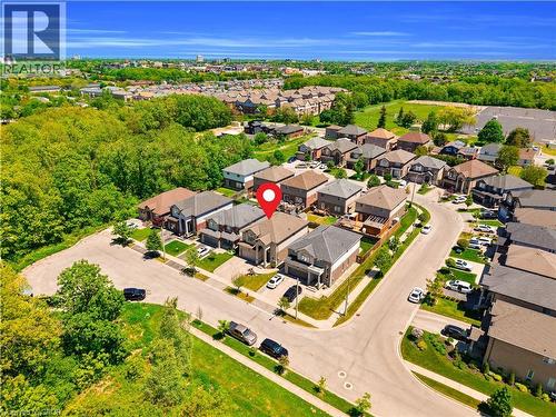 Aerial perspective showcasing a residential street with detached and semi-detached homes - 92 Desoto Drive, Hamilton, ON - Outdoor With View