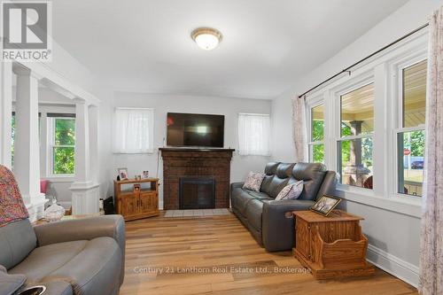 7 Purdy Street, Belleville (Belleville Ward), ON - Indoor Photo Showing Living Room With Fireplace