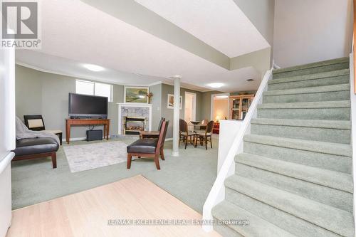 62 Atkins Circle, Brampton, ON - Indoor Photo Showing Other Room With Fireplace
