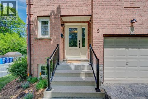 Garage with inside entry into the home - 375 Holiday Inn Drive Unit# 9, Cambridge, ON - Outdoor With Exterior