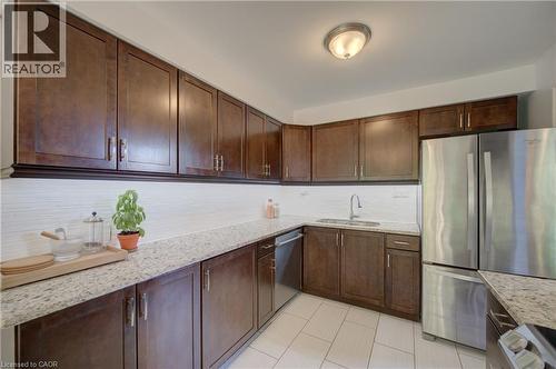 Kitchen with granite counters. Appliances included. - 375 Holiday Inn Drive Unit# 9, Cambridge, ON - Indoor Photo Showing Kitchen