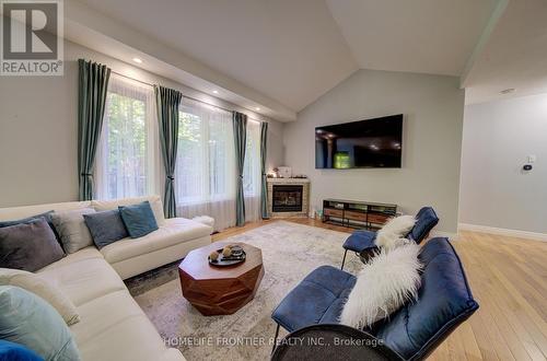 42 Forest Circle, Tiny, ON - Indoor Photo Showing Living Room With Fireplace