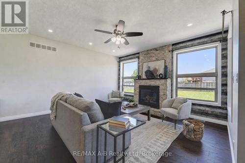 70 Kenton Street, West Perth (Mitchell), ON - Indoor Photo Showing Other Room With Fireplace