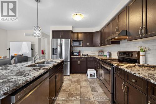 4 Drone Crescent, Guelph (Willow West/Sugarbush/West Acres), ON - Indoor Photo Showing Kitchen With Double Sink