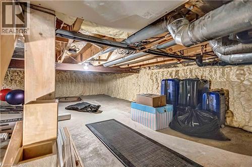 Unfinished basement offering ample storage space, exposed ductwork, and spray foam insulation - 640 Acadia Drive, Hamilton, ON 