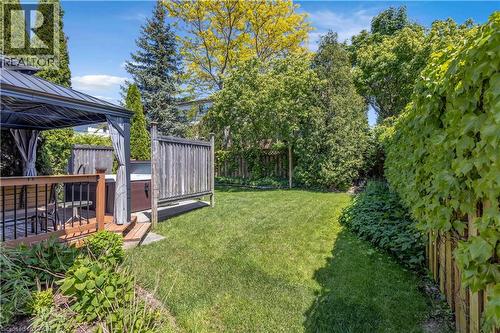Expansive backyard featuring a lush lawn and established landscaping - 640 Acadia Drive, Hamilton, ON 