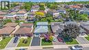 Residential street featuring multiple single-family homes with varying architectural styles - 640 Acadia Drive, Hamilton, ON 