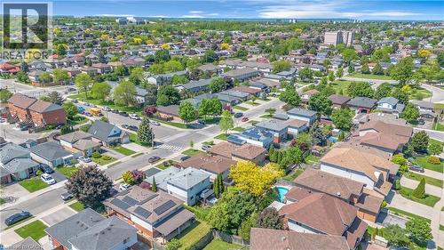 Aerial perspective showcasing a residential neighborhood with varied architectural styles and established landscaping - 640 Acadia Drive, Hamilton, ON 